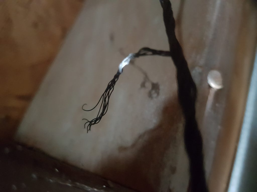 Cable showing damaged strands for the garaged door
