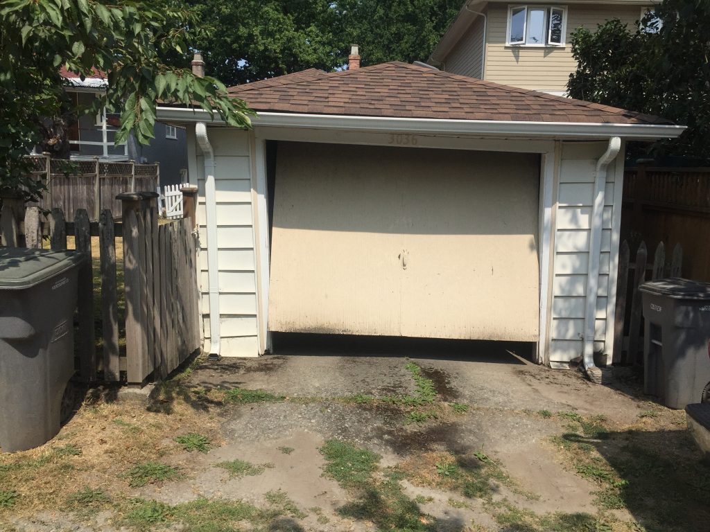 Vancouver Garage Door before install of new multi-section garage door