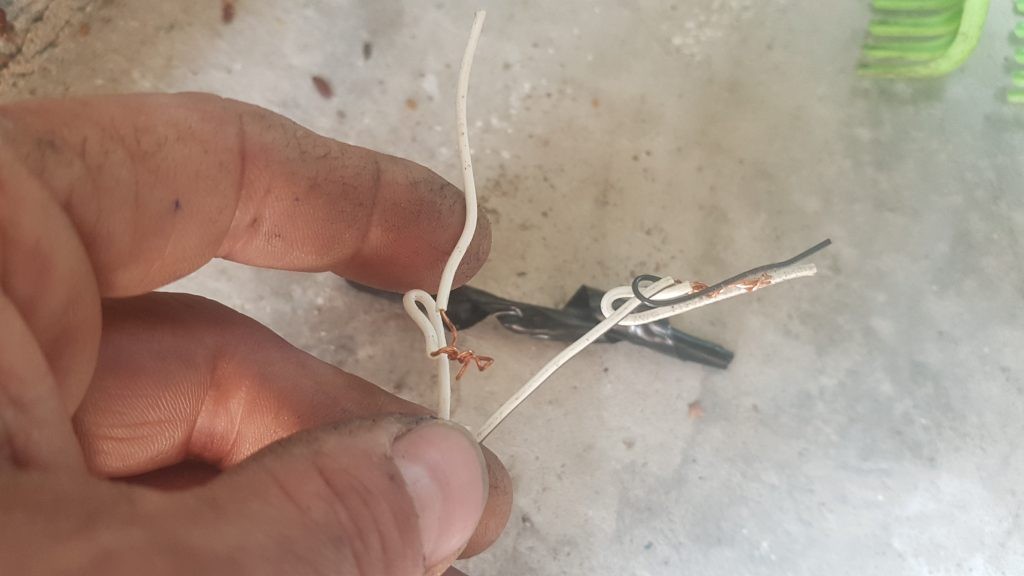 Black tape connection is faulty. This is a issue. Please let a service technician wire all safety related wires. 