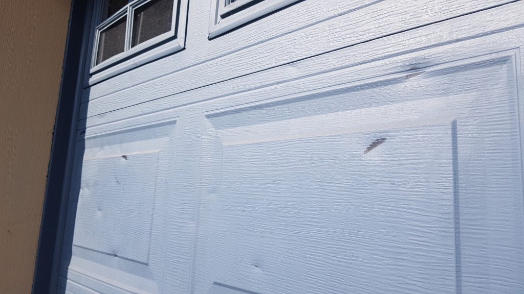 Garage door replacement from puck damage.  call us at: 604-940-8918