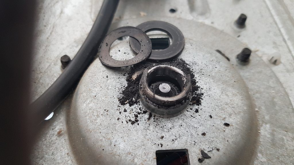 View of broken sprocket  on a LiftMaster chain drive motor