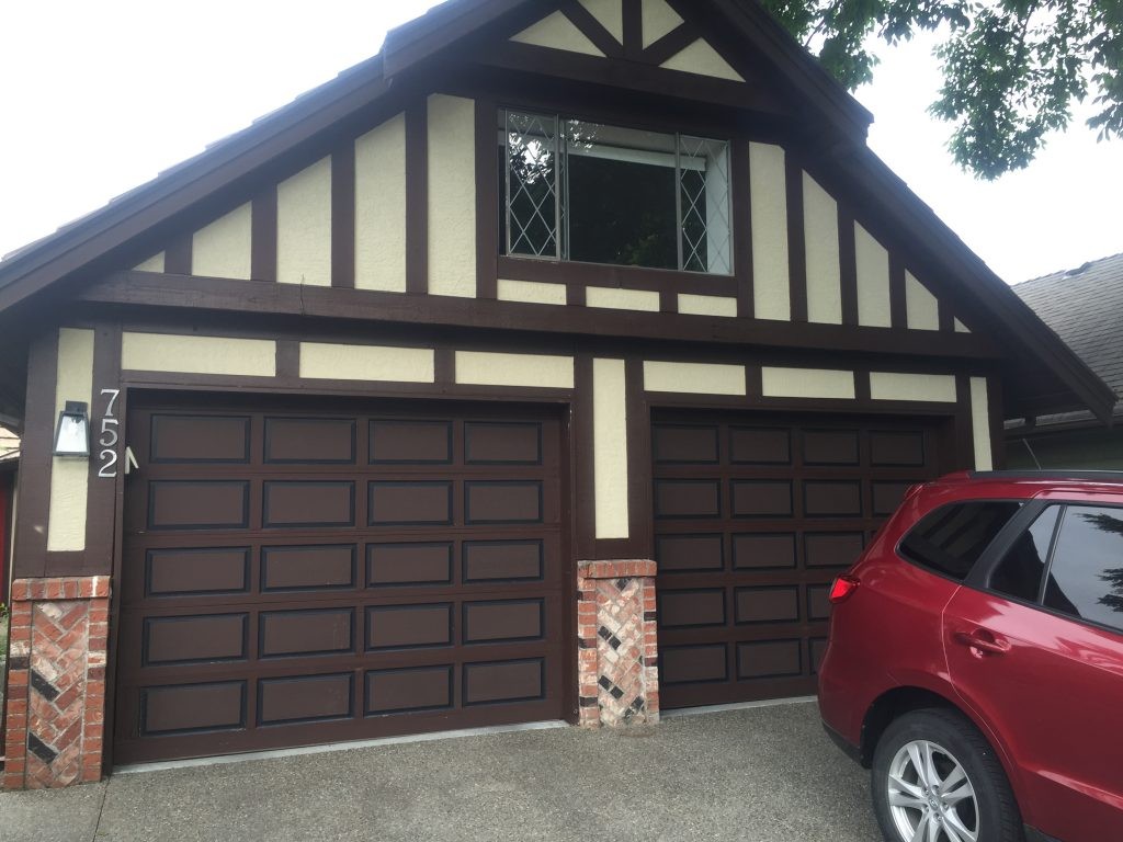 View of garage doors before install