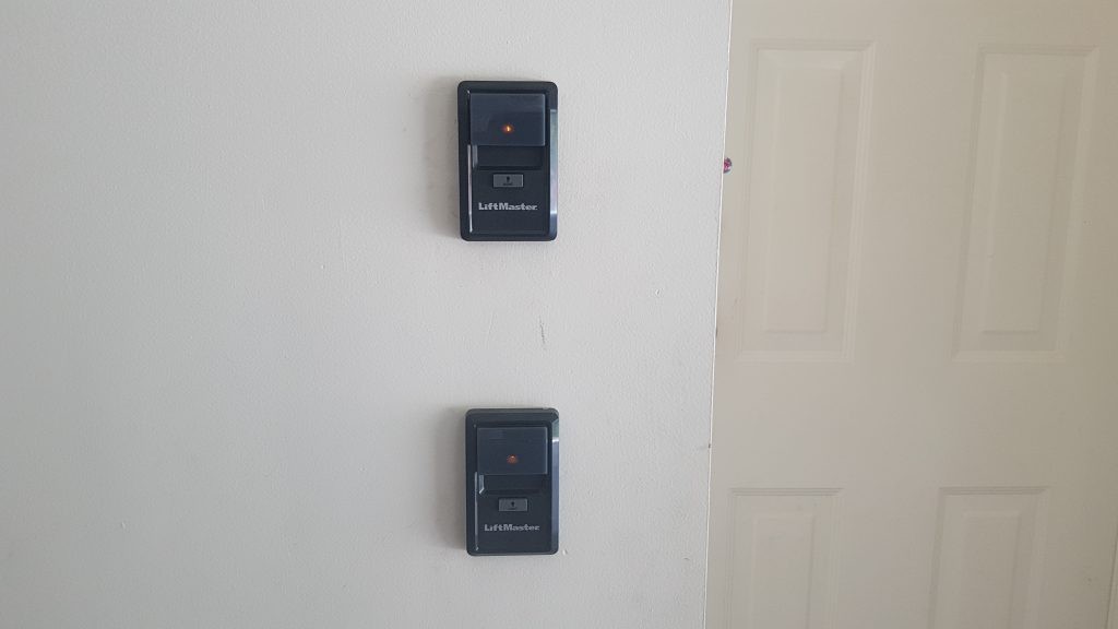 View of wall buttons that have been installed with the new operators
