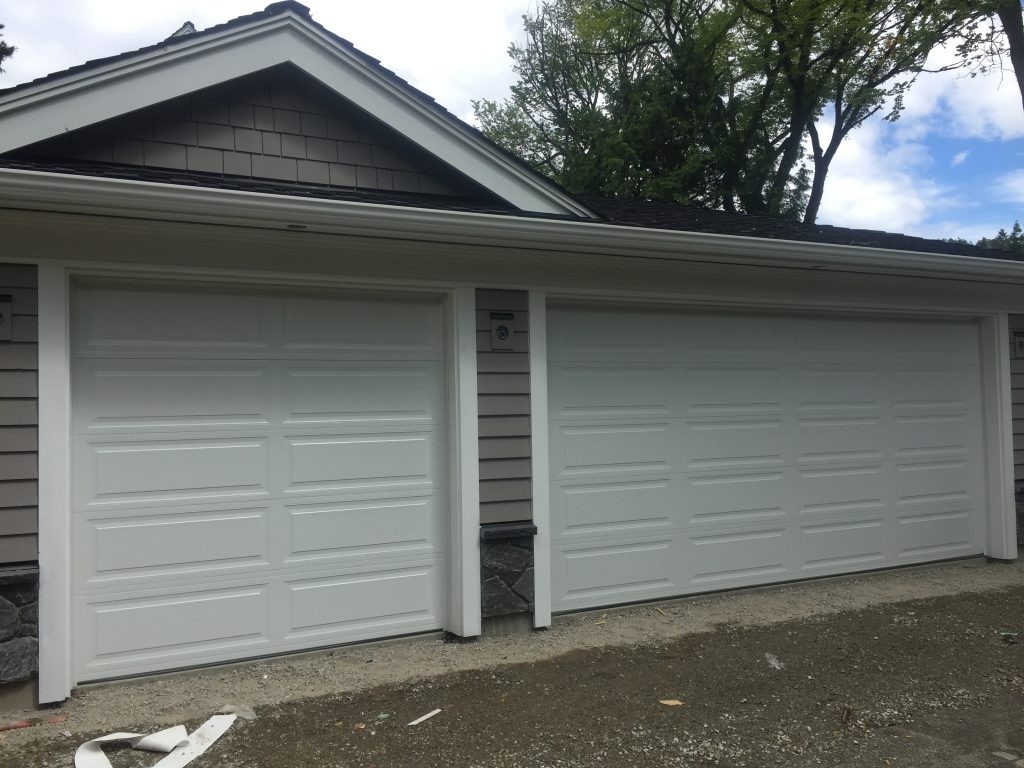 View of two garage doors that have been installed.