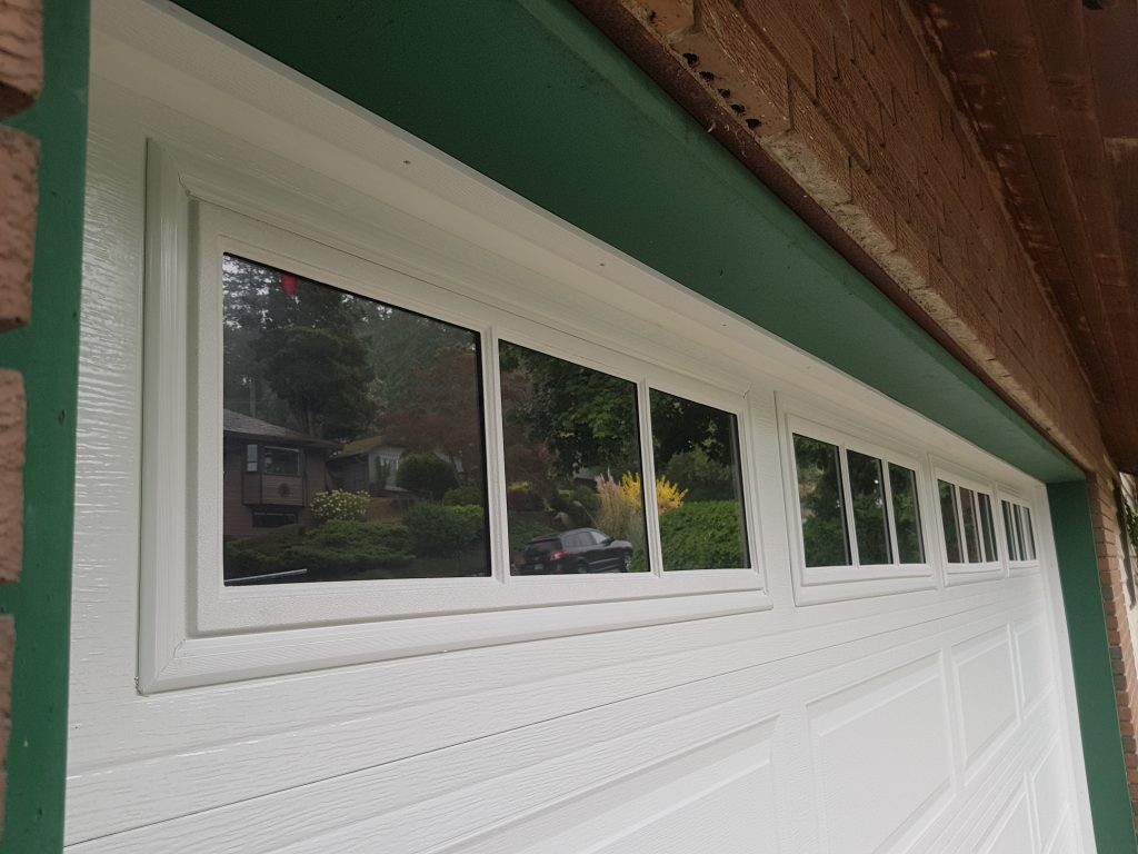 Installed Window Inserts on Insulated Steel Garage Door in Delta