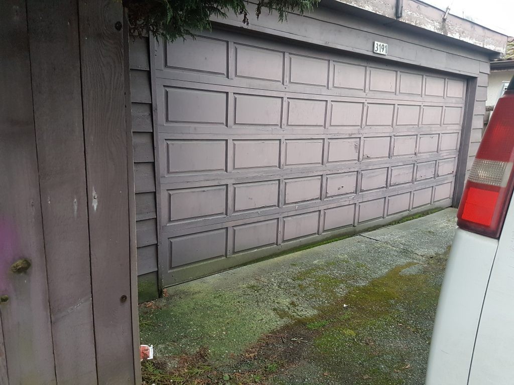 View of garage door after rollers are fixed.