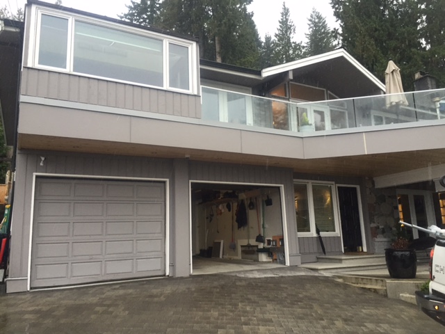 Before view of new garage doors installed in North Vancouver