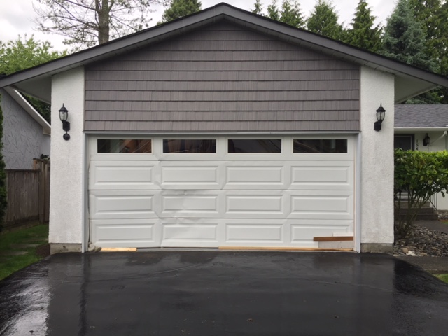 Replaced 16 x 7 double car garage door